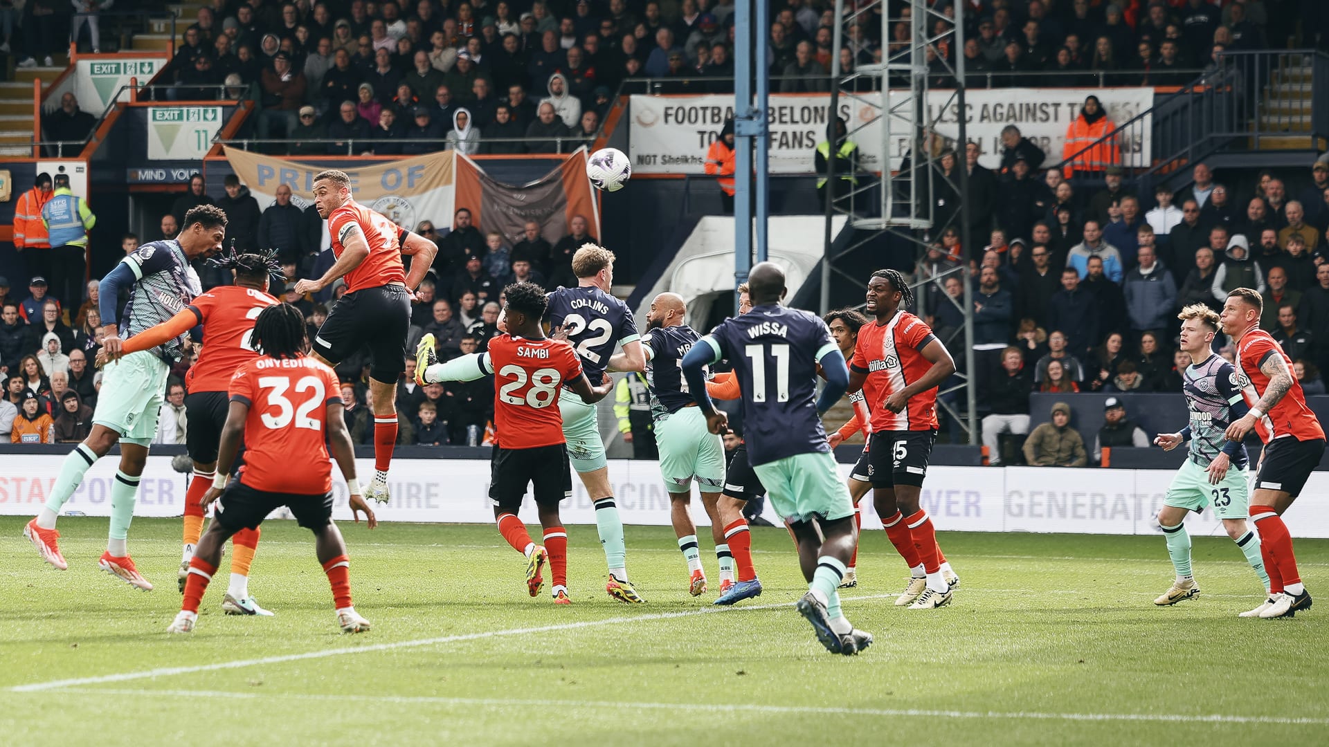 Mountain: Ethan Pinnock, on his first start since February, rises above the crowd to meet Sergio Reguilón’s corner and extend the Bees’ advantage
